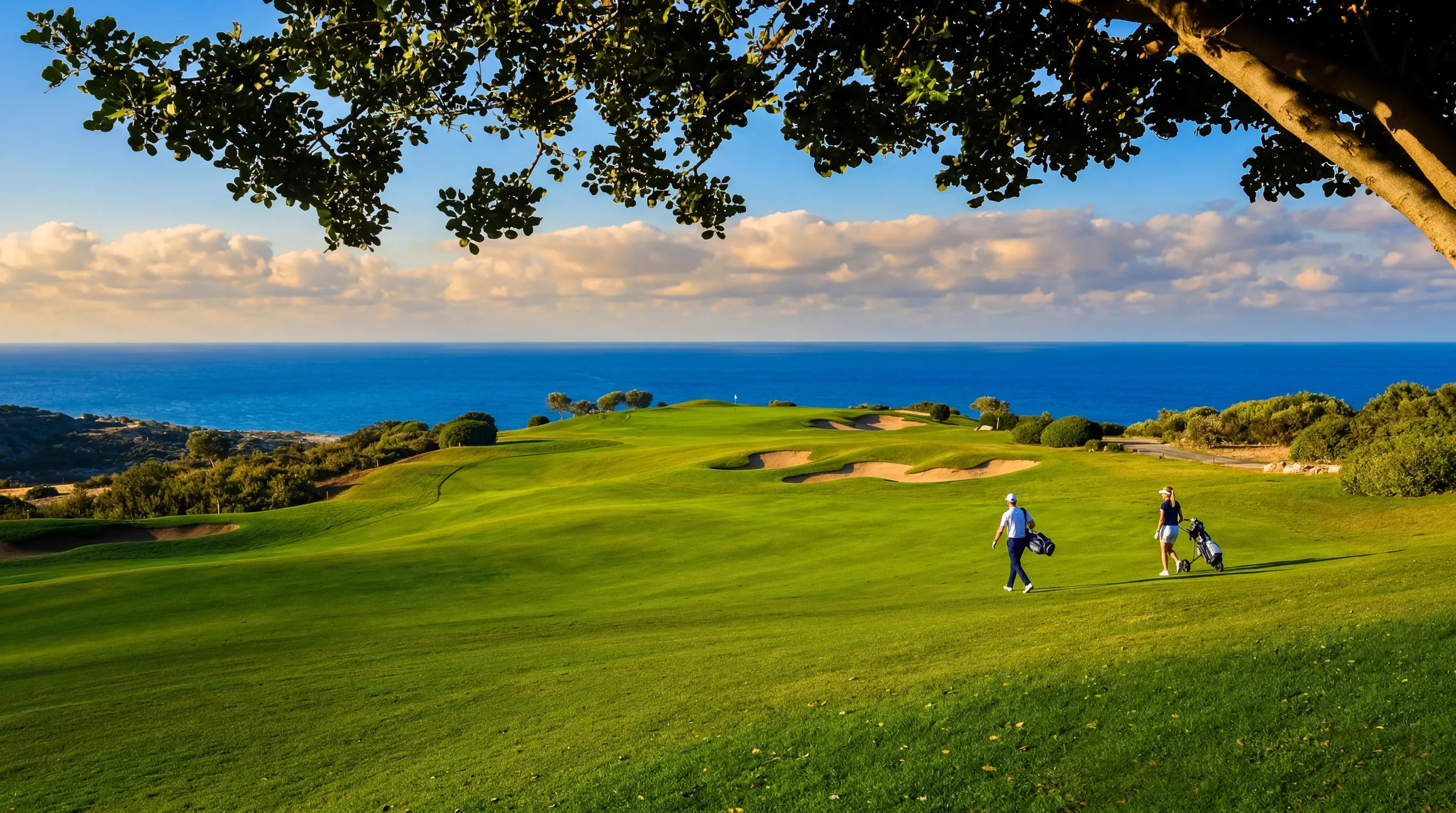 Championship golf course with landscaped hills and Mediterranean views